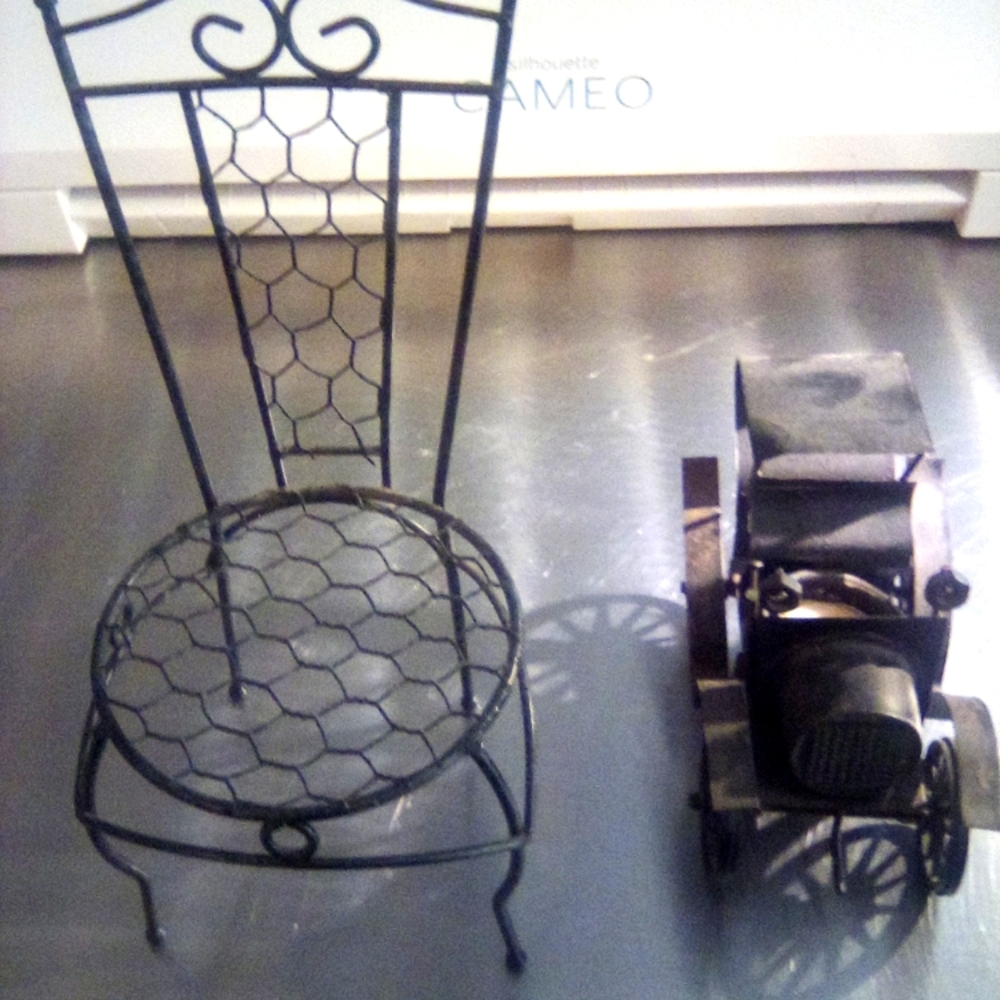 Black Metal Wire Chair and Vintage Car Decor